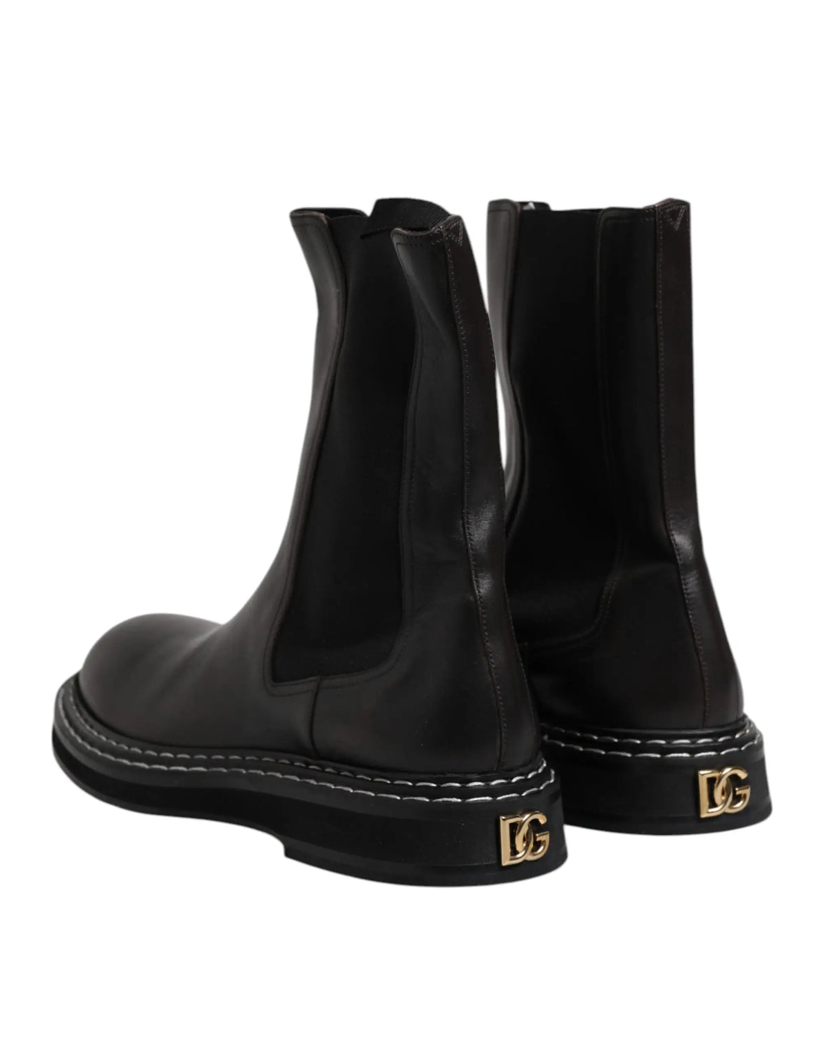 Vue arrière des bottes plates mi-mollet en cuir noir dolce & gabbana avec logo dg doré sur le talon