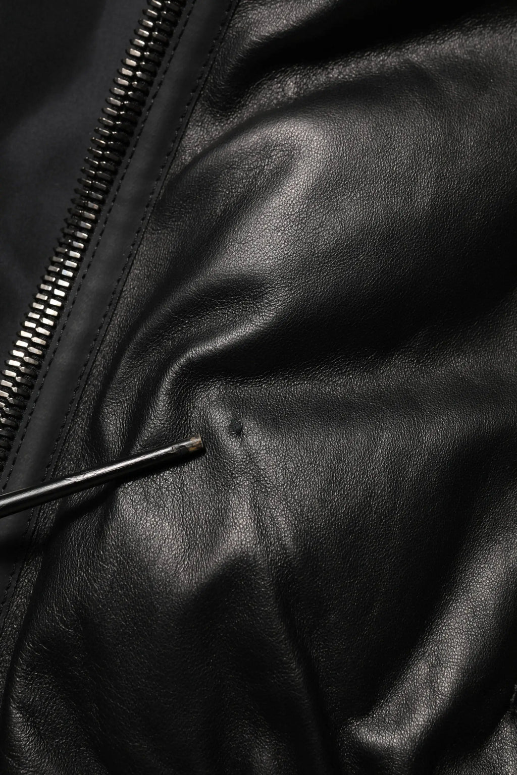 Dolce & Gabbana blouson noir en cuir et nylon avec fermeture éclair le long de la couture