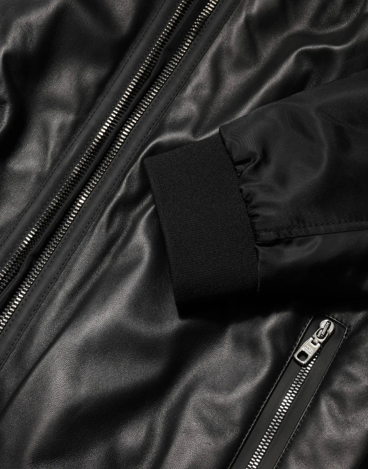 Dolce & gabbana blouson noir en nylon et cuir avec fermeture éclair intégrale et poignets côtelés en faux cuir noir