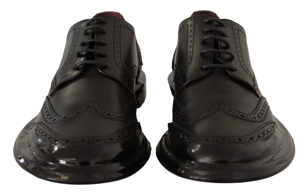 Dolce & gabbana chaussures derby formelles en cuir noir avec mocassin wingtip et semelles sculptées brillantes