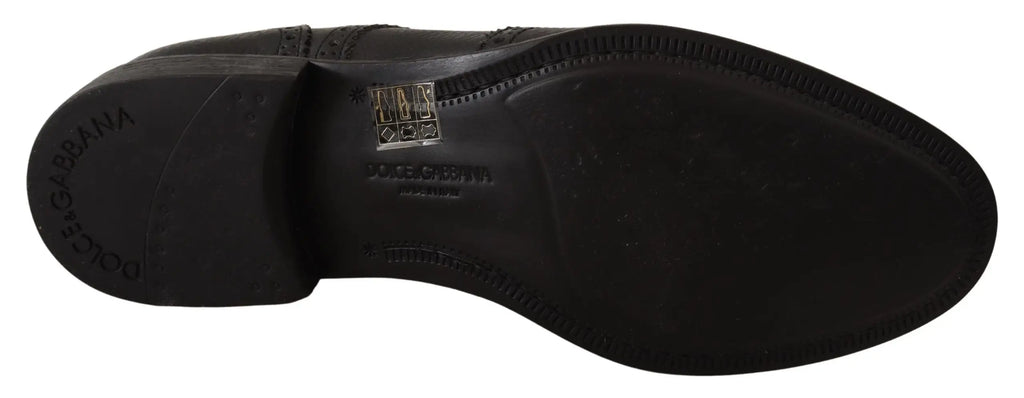 Semelle arrière en cuir noir de chaussure oxford wingtip dolce & gabbana avec logo embossé et étiquette drapeau italien