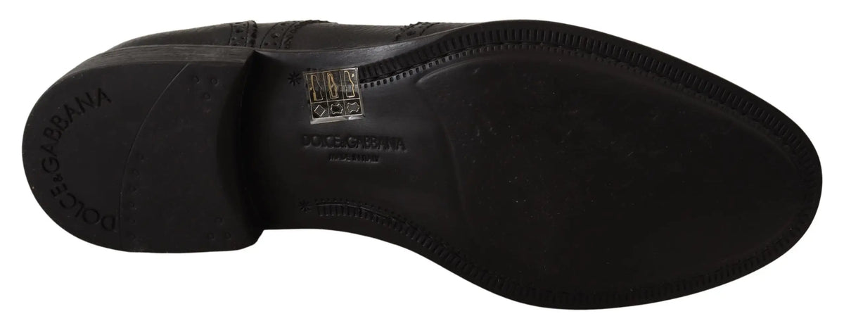 Semelle arrière en cuir noir de chaussure oxford wingtip dolce & gabbana avec logo embossé et étiquette drapeau italien