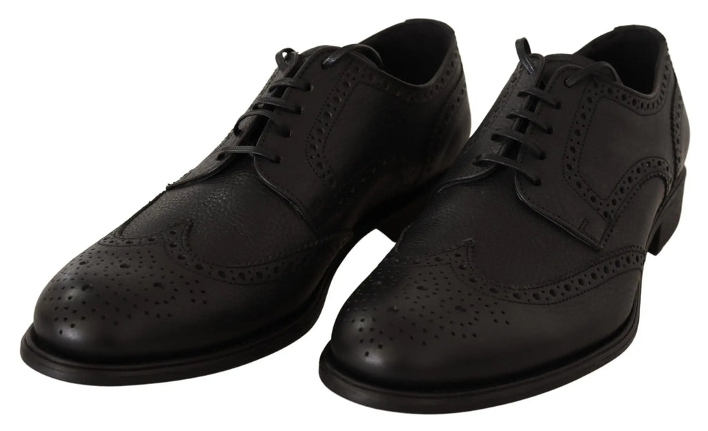 Dolce & gabbana chaussures habillées oxford en cuir noir avec perforations et design wingtip classique