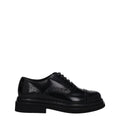 Dolce & gabbana chaussures oxford et derby en cuir noir à semelle épaisse effet verni style brogue