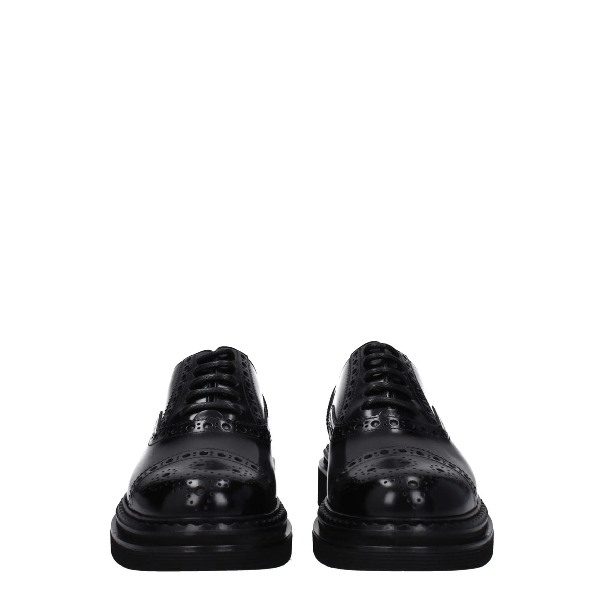 Dolce & gabbana black leather brogue oxford shoes with glossy patent finish and detailed perforated patterns