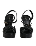 Dolce & gabbana sandales à talons plateforme en cuir noir avec nœud et boucle métallique ornée