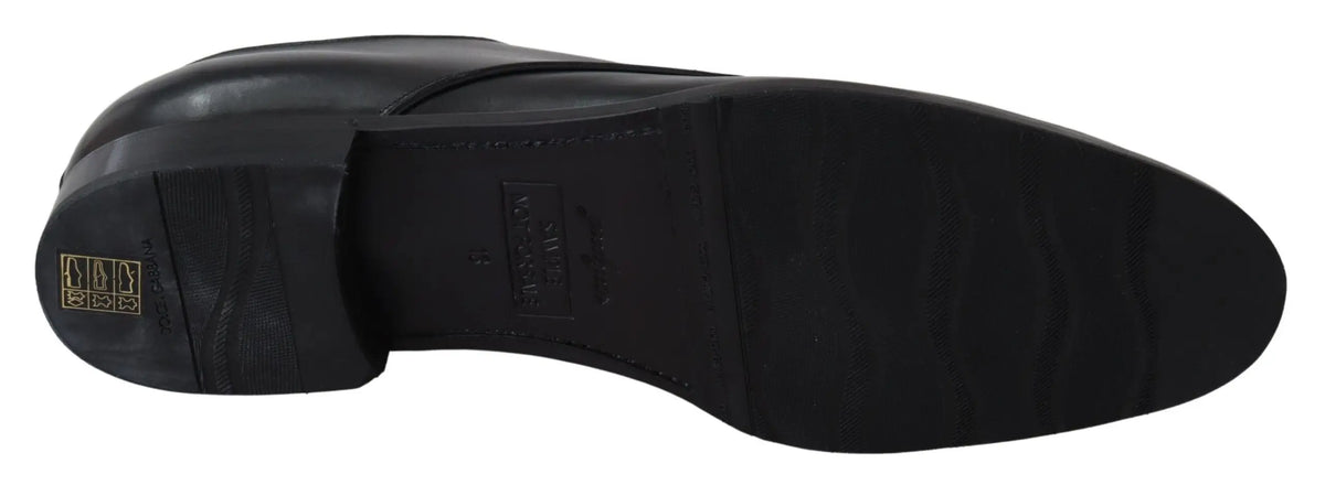 Chaussure habillée pour homme en cuir noir dolce & gabbana sartoria faite main vue de dos avec finition lisse et embossage
