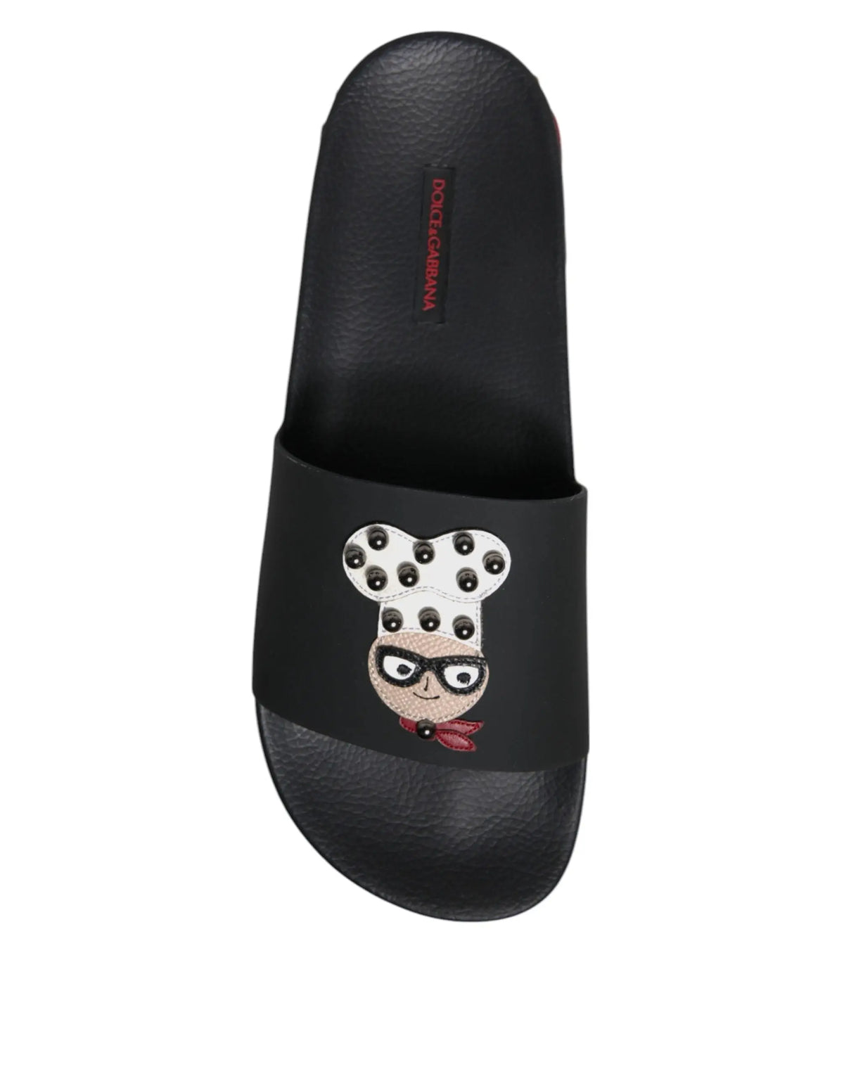 Dolce & gabbana sandales slides noires en cuir avec chef cartoon à lunettes noires toque à pois blancs et noeud papillon rouge