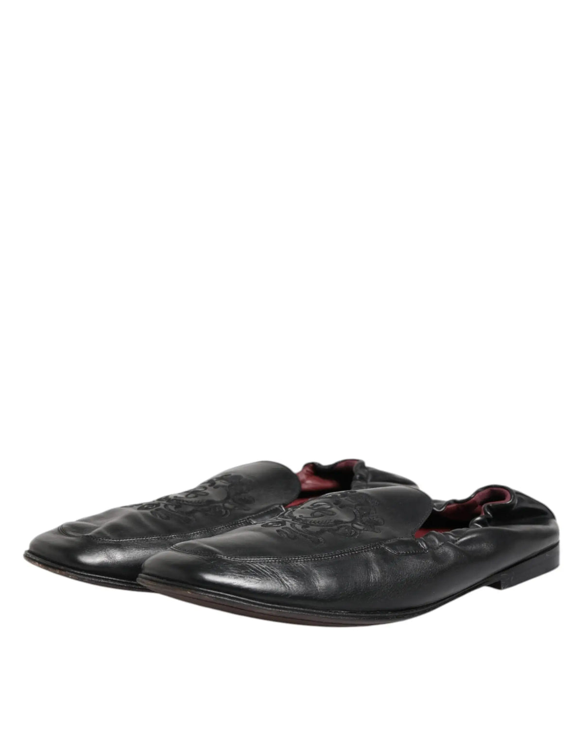 Dolce & gabbana mocassins plats pour hommes en cuir noir avec motifs crane embossés et doublure bordeaux
