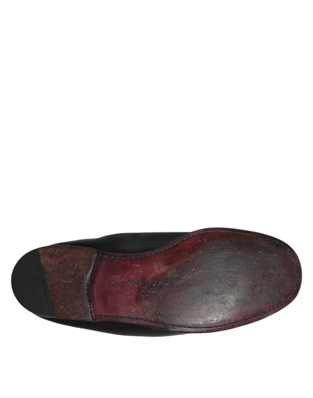 Dolce & gabbana mocassins hommes slip on en cuir noir avec semelle usée rouge brunâtres vus de dos
