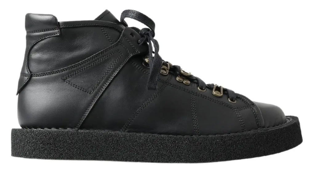 Botte slip on dolce & gabbana en cuir noir avec tige stretch et semelle épaisse en caoutchouc