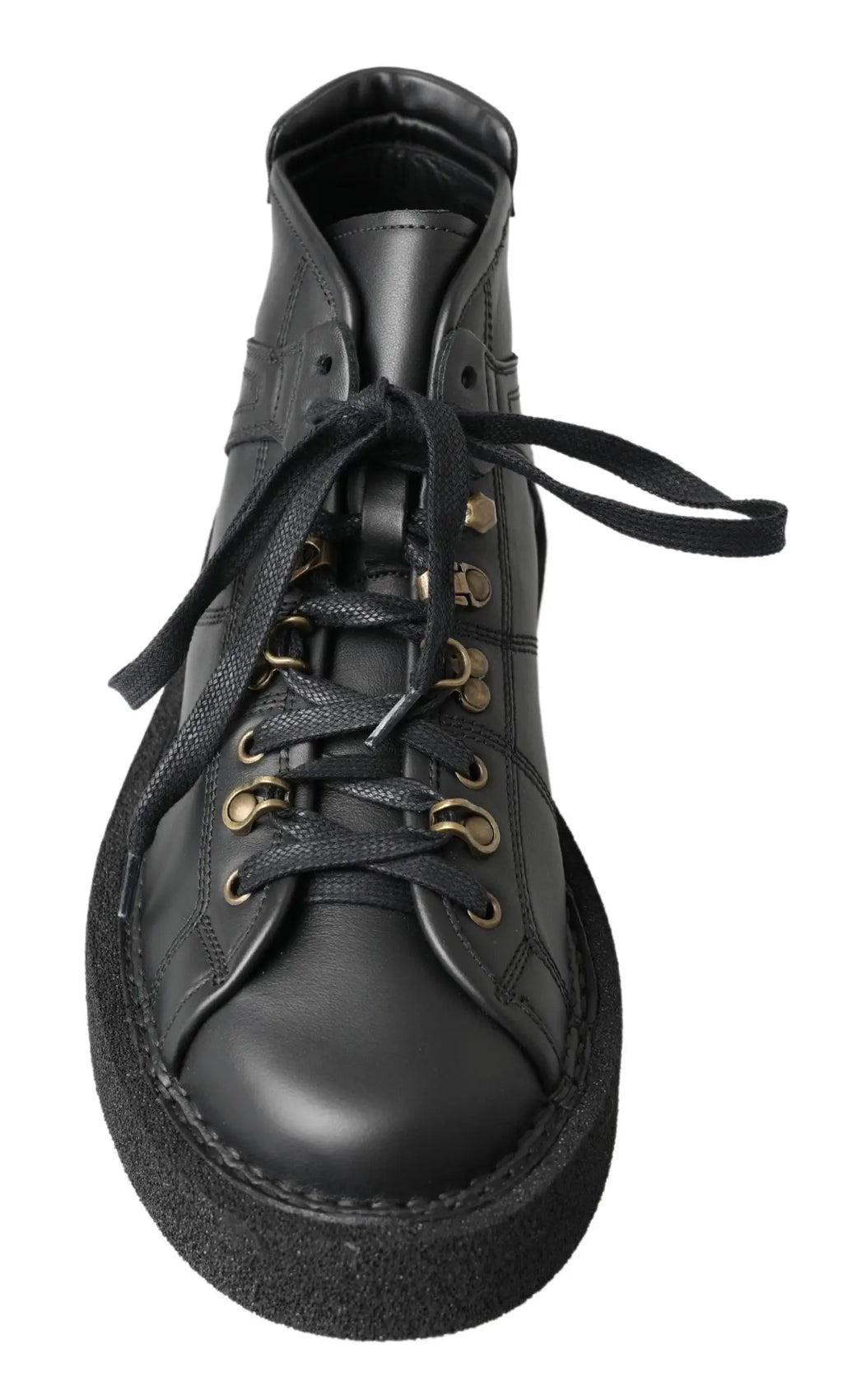 Bottes slip on en cuir noir dolce & gabbana avec tige haute, œillets dorés et semelle en caoutchouc épaisse