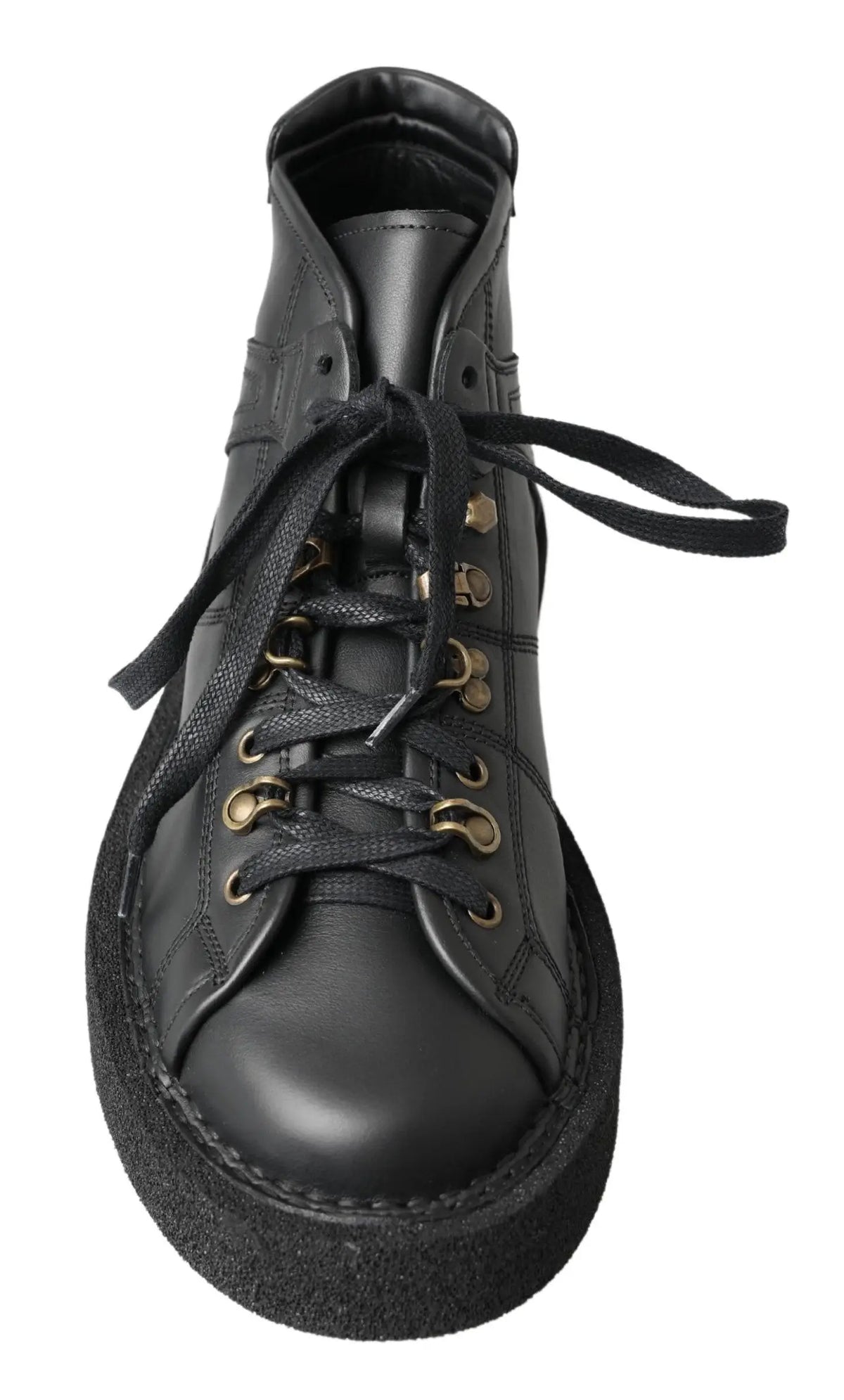 Bottes slip on en cuir noir dolce & gabbana avec tige haute, œillets dorés et semelle en caoutchouc épaisse
