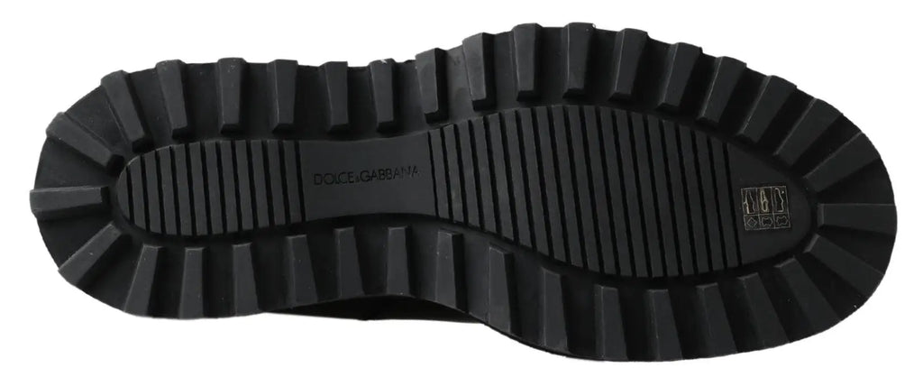 Semelle en caoutchouc noir texturée avec logo embossé dolce et gabbana pour bottines extensibles en cuir noir