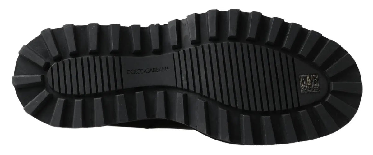 Semelle en caoutchouc noir texturée avec logo embossé dolce et gabbana pour bottines extensibles en cuir noir