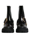 Dolce & gabbana bottes trekking en cuir noir verni avec boucles dorées et semelles en caoutchouc épaisses