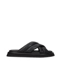 Dolce gabbana slippers en cuir noir avec brides croisées et semelle en caoutchouc chunky
