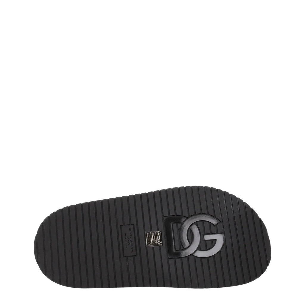 Semelle extérieure noire en caoutchouc texturée avec logo dg argenté embossé sur des mules en cuir dolce gabbana