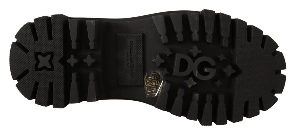 Semelle extérieure noire en caoutchouc avec logo dg embossé et motifs étoile pour bottes combat cloutées en cuir noir dolce & gabbana