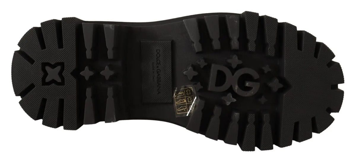 Semelle extérieure noire en caoutchouc avec logo dg embossé et motifs étoile pour bottes combat cloutées en cuir noir dolce & gabbana