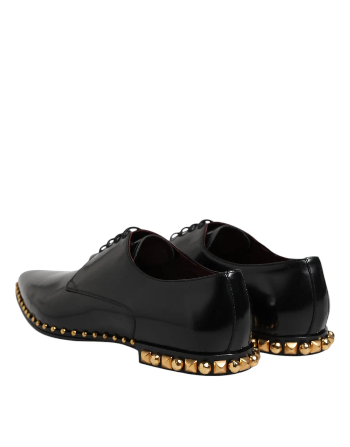Dolce & Gabbana chaussures derby homme en cuir noir verni avec clous métalliques dorés sur la semelle et le bout