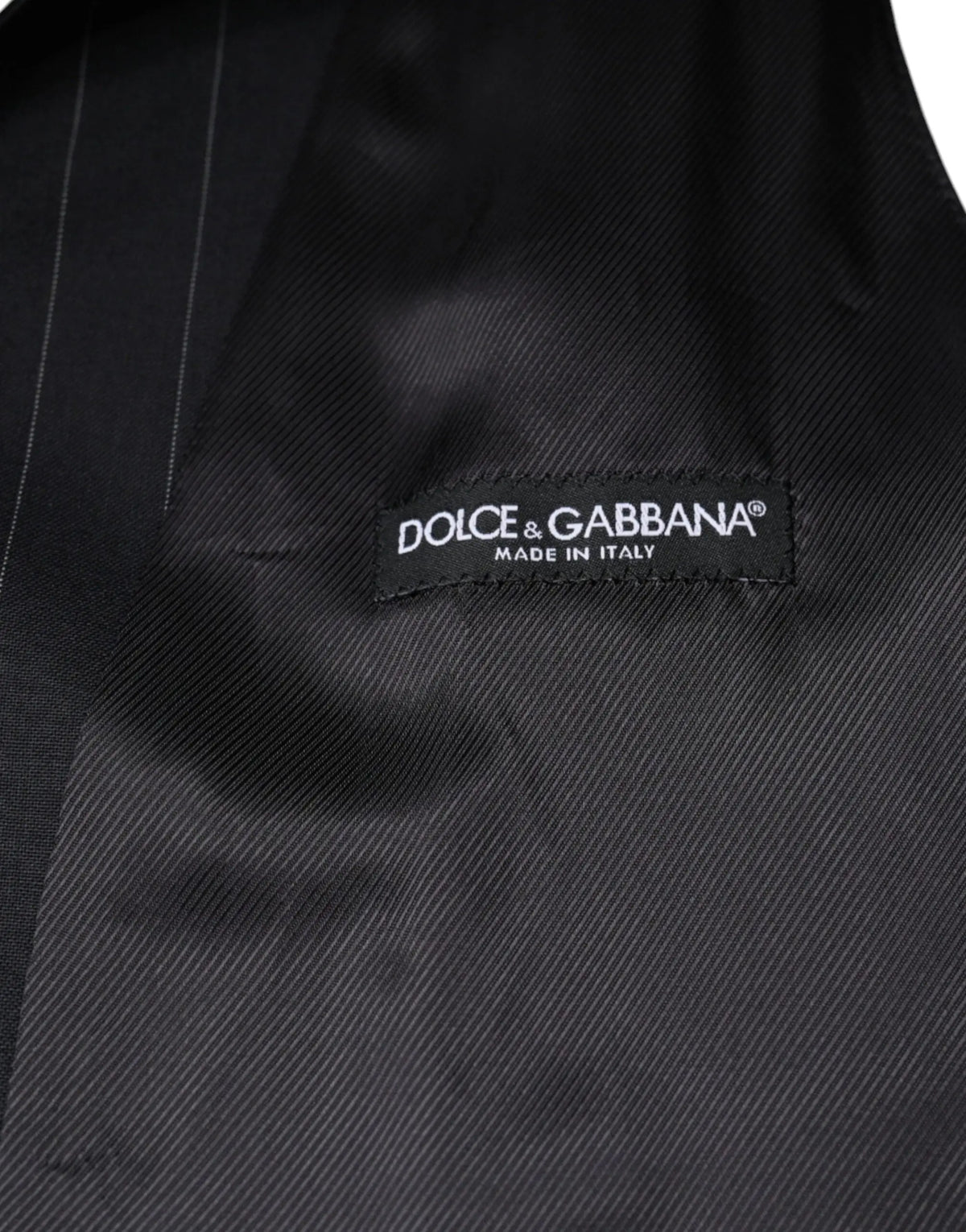 Dolce & gabbana black leather waistcoat dress with fine pinstripes and branded label for formal wear