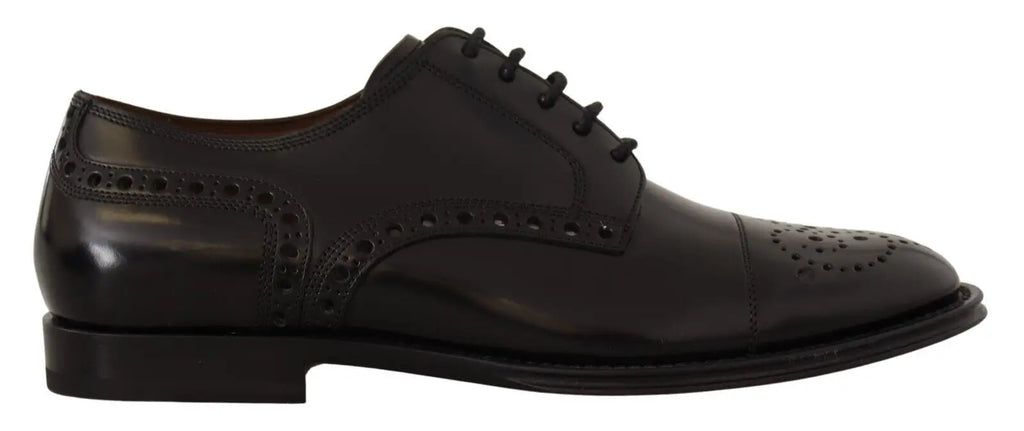 Dolce & gabbana chaussures derby homme en cuir noir avec finition polie et perforations décoratives style brogue