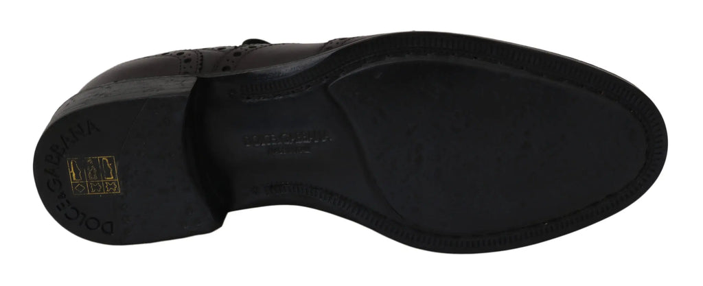 Dolce & gabbana chaussures en cuir noir oxford avec motif brogue classique et logo embossé sous la semelle