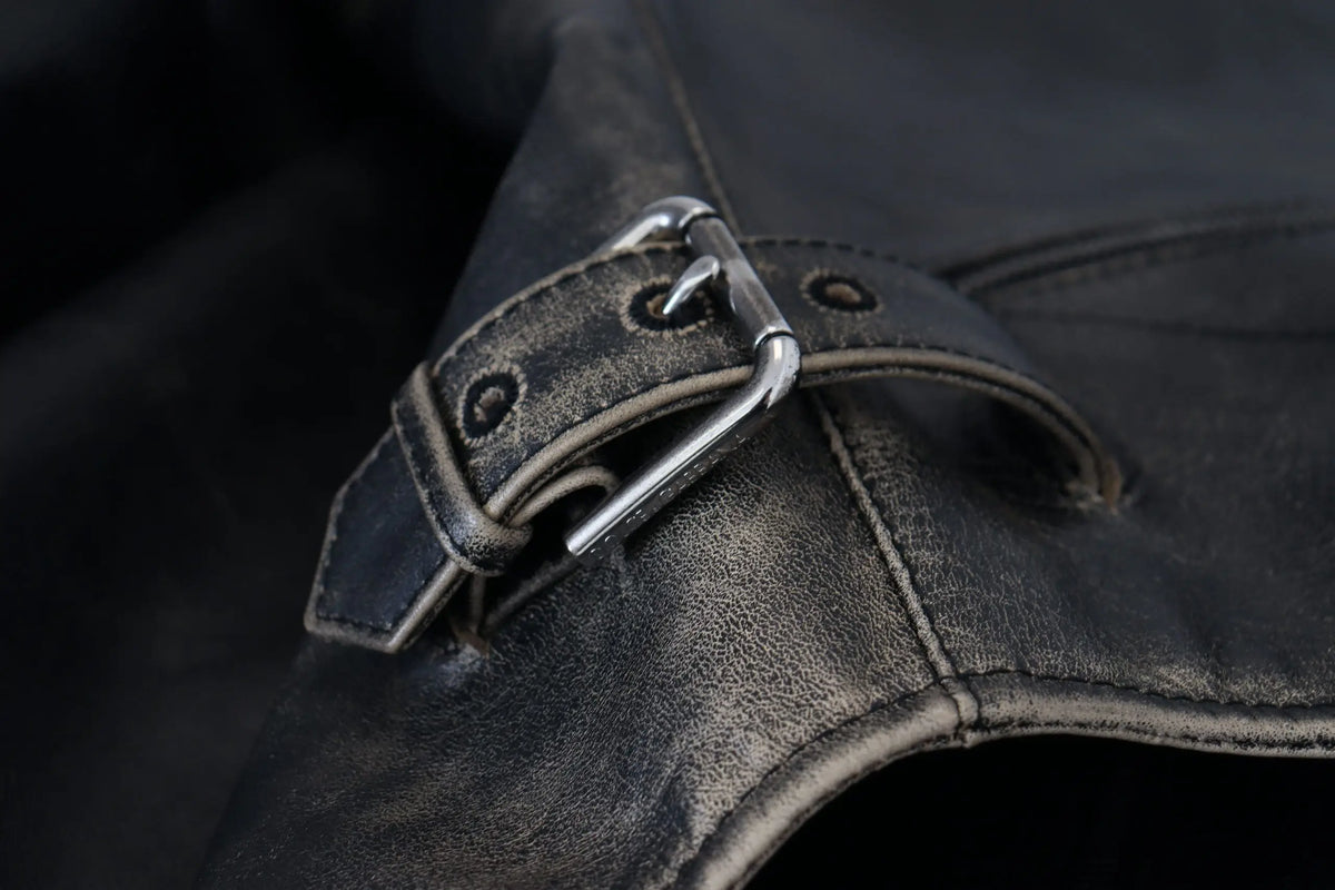Black leather strap with silver-toned metal buckle on dolce & gabbana black leather zipper biker coat jacket