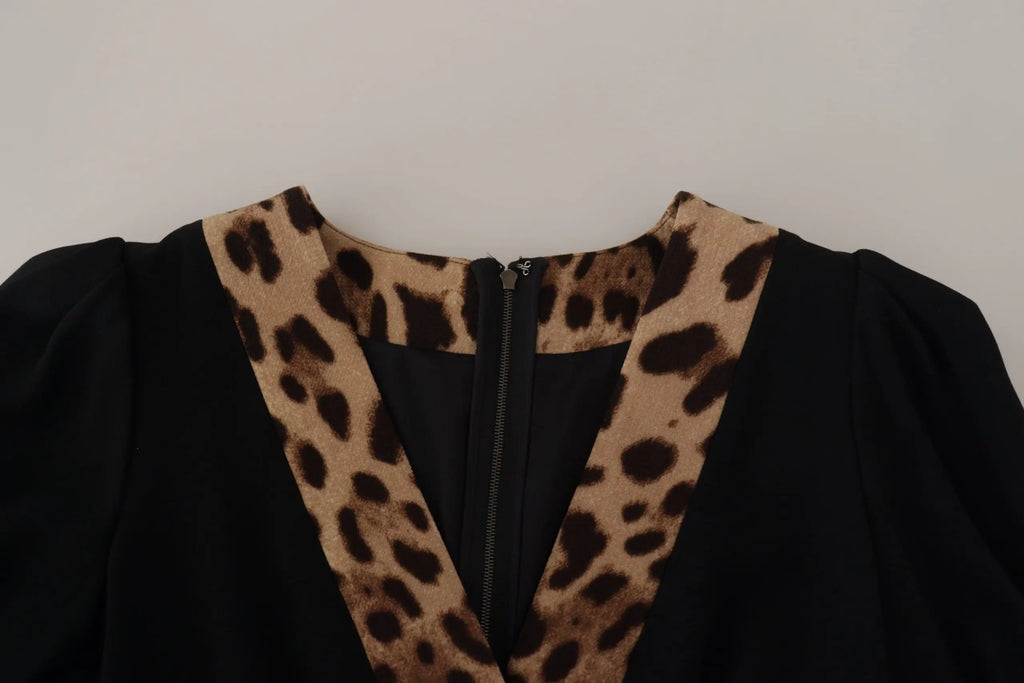 Robe noire dolce & gabbana à col léopard audacieux et fermeture éclair élégante en coupe évasée au genou