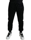 Dolce gabbana jogger slim en coton noir velours avec motif léopard subtil et taille à cordon