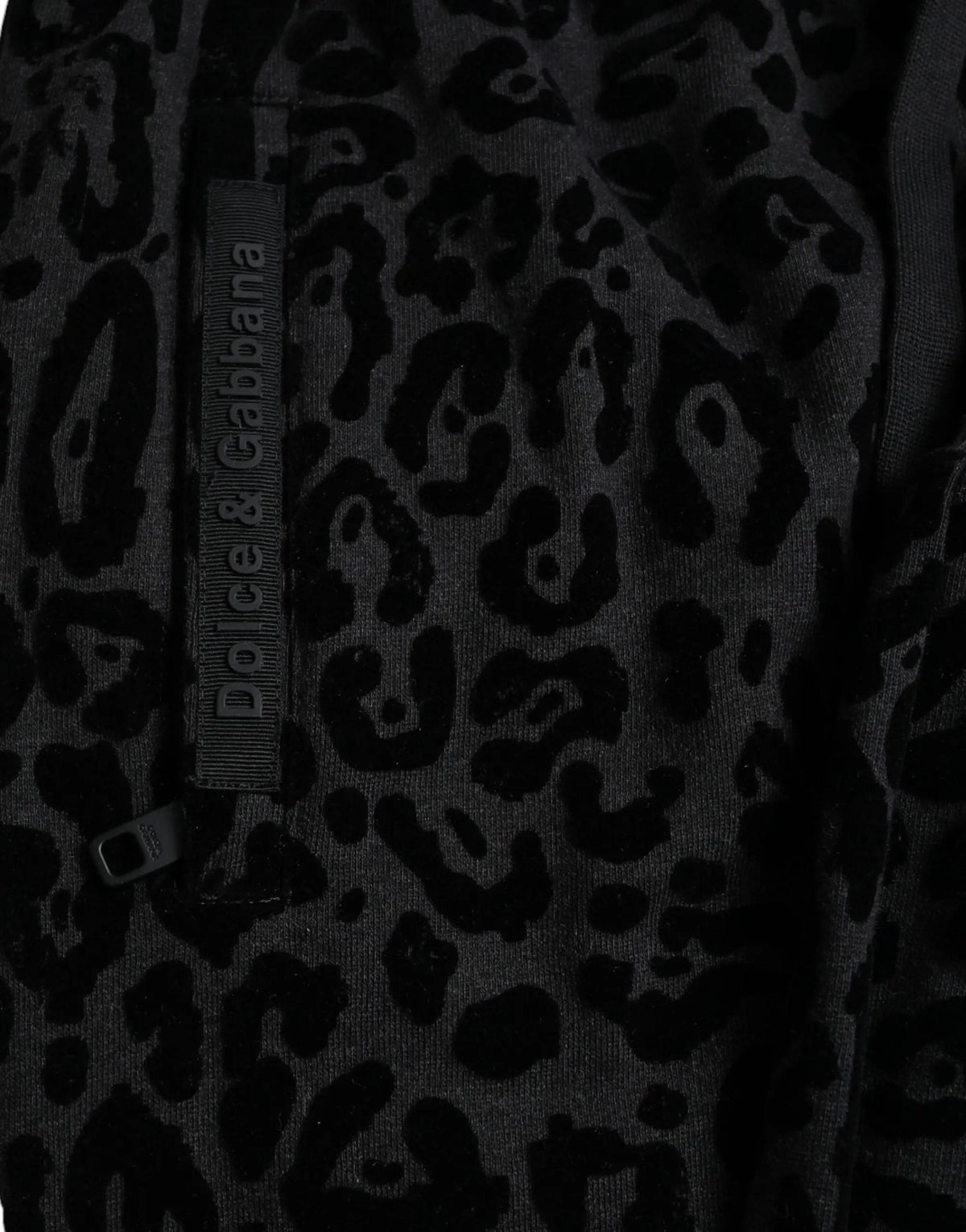 Pantalon slim jogger dolce & gabbana en coton noir imprimé léopard avec étiquette grise de la marque