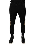 Dolce & gabbana joggers noirs slim fit avec patches léopard sur les cuisses en tissu confortable