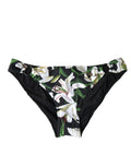 Bas de bikini dolce gabbana noir à imprimé lys blanc avec feuilles vertes et anneaux métalliques dorés sur les côtés