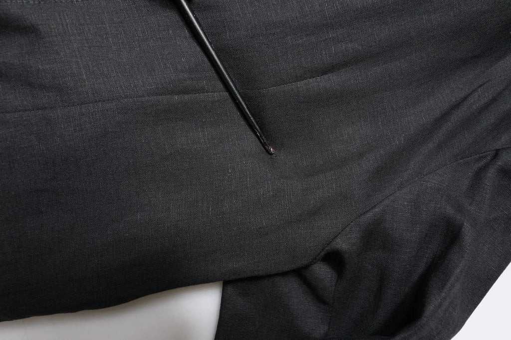 Tissu noir texturé avec motif tissé subtil pour manteau blazer homme en lin dolce gabbana simple boutonnage