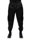 Dolce & gabbana joggers noirs en satin avec motif logo dg discret et taille élastique à cordon
