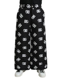 Pantalon large matelassé noir dolce & gabbana avec motif répétitif blanc du logo dc