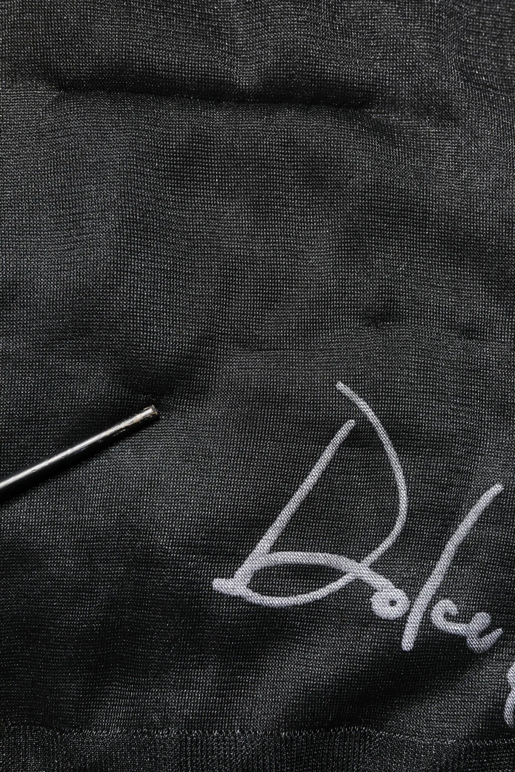 Pull à col rond en maille dolce gabbana noir avec logo dolce brodé en argent sur tissu texturé noir