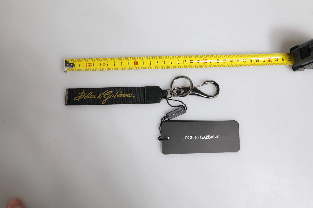 Porte-clés dolce & gabbana noir en cuir avec logo doré et mousqueton en métal pour homme en nylon, laiton et argent
