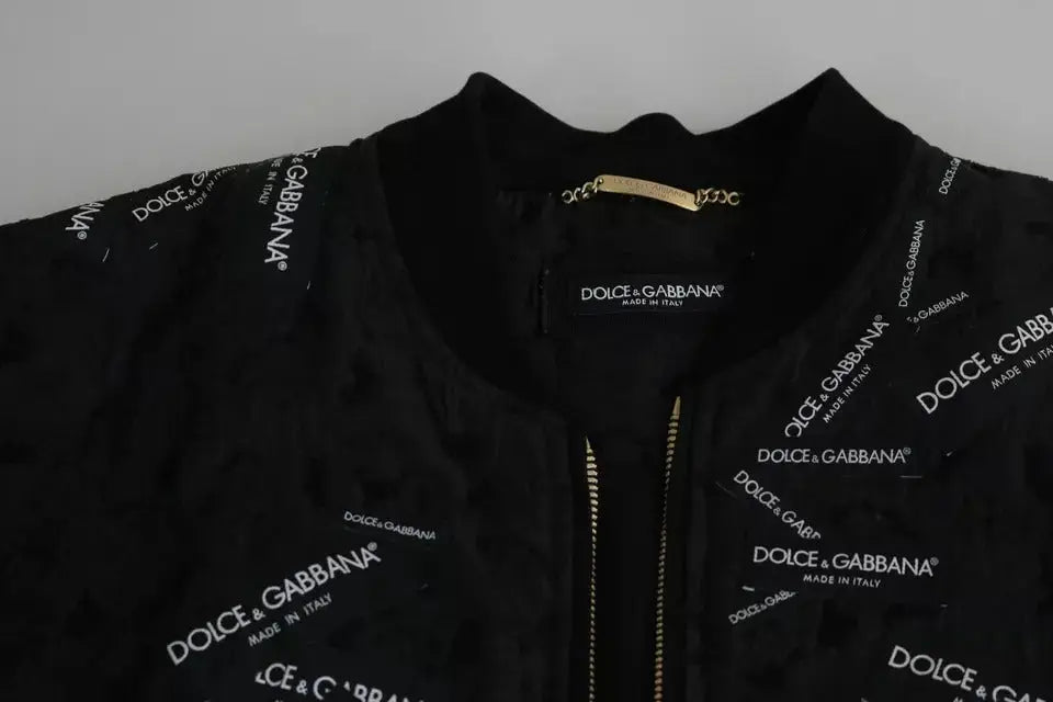 Dolce & gabbana bomber noir en brocart avec logo blanc répété et fermeture éclair ton or