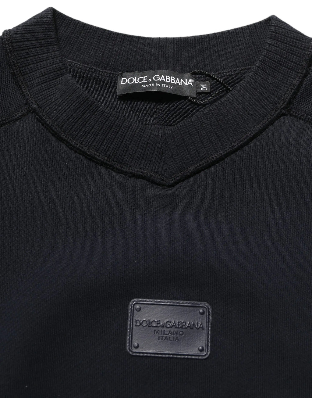Pull en coton noir dolce & gabbana à col rond avec patch en cuir noir et logo plaque au niveau de la poitrine