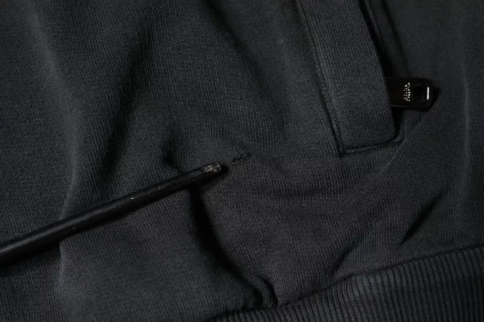 Tissu noir texturé avec fermeture éclair et stylo sur pull à capuche zippé intégral dolce & gabbana avec logo