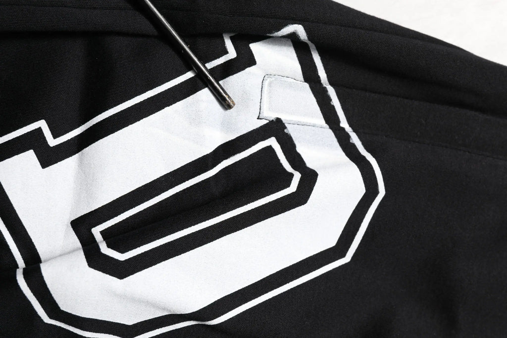 Sweat à capuche noir dolce & gabbana en coton avec grand c blanc bordé noir style varsity