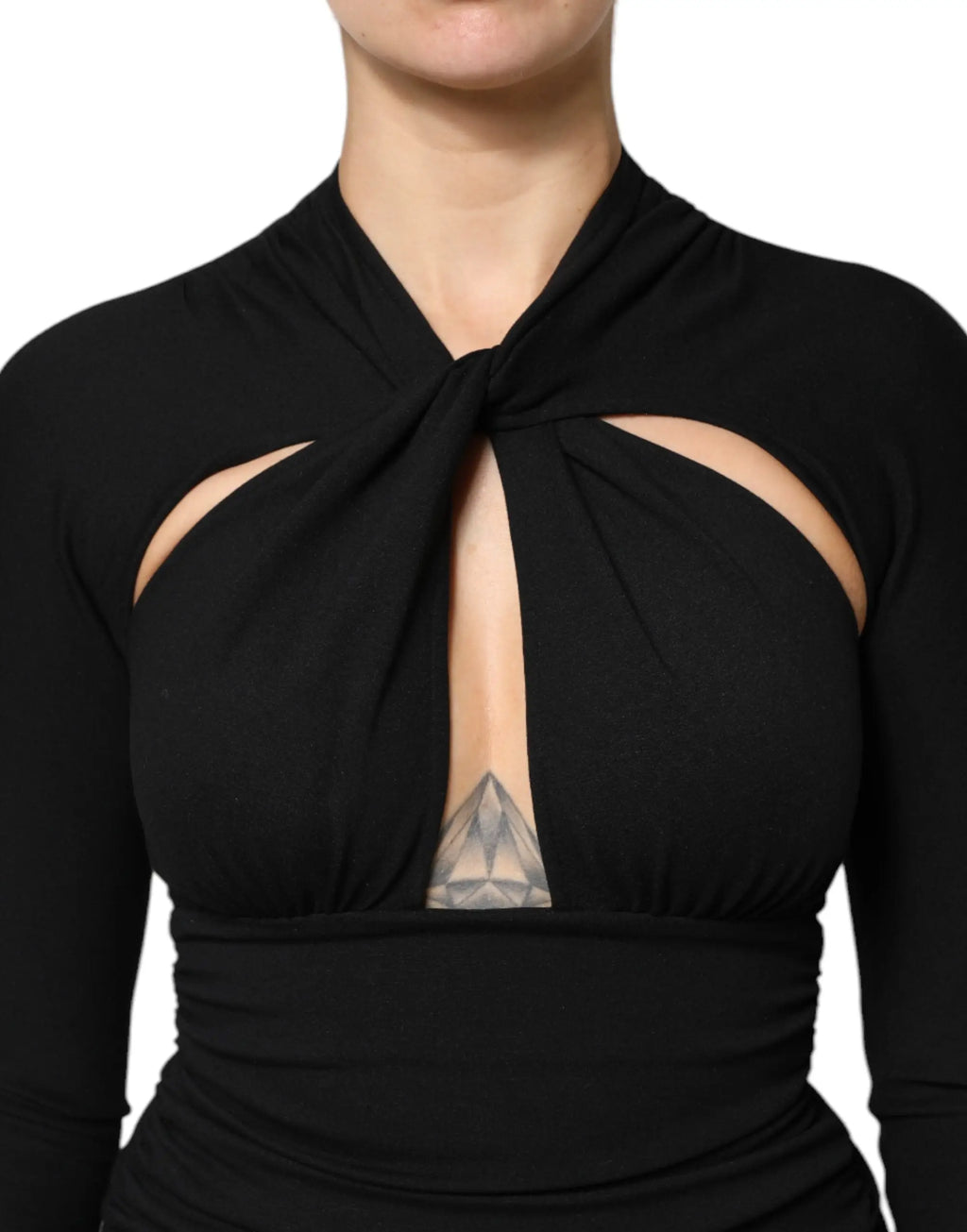 Top noir à manches longues dolce & gabbana avec encolure nouée et épaules découpées élégant et moderne