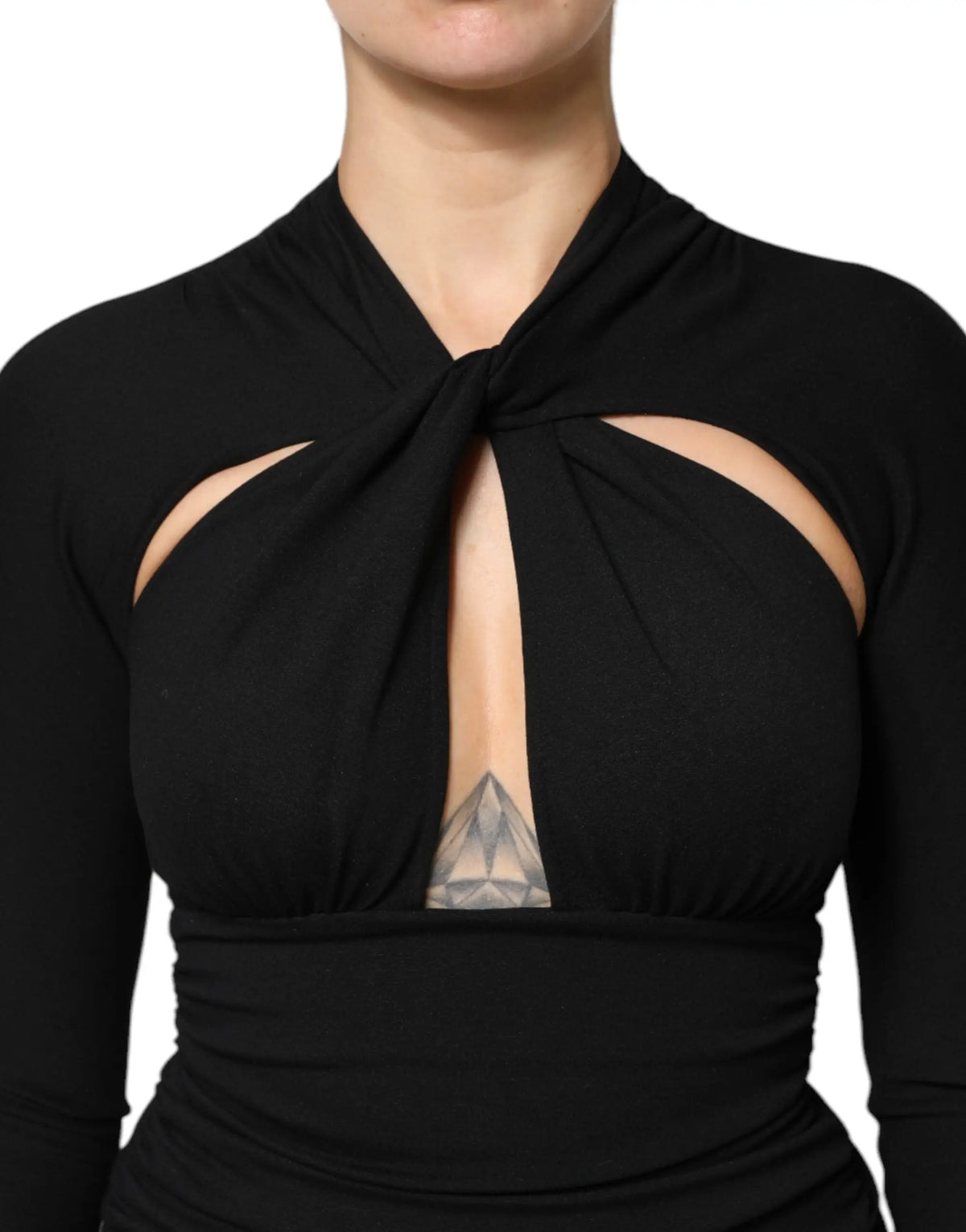 Top noir à manches longues dolce & gabbana avec encolure nouée et épaules découpées élégant et moderne