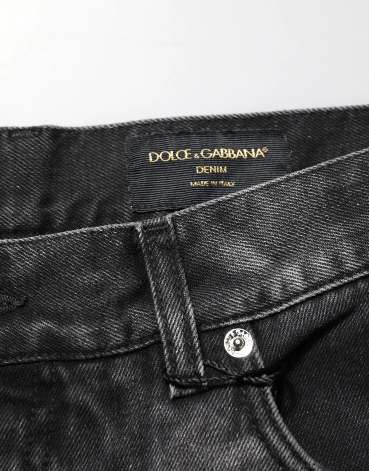 Jeans droits en denim noir effet marbré dolce gabbana pour homme avec étiquette dorée embossée made in italy au dos