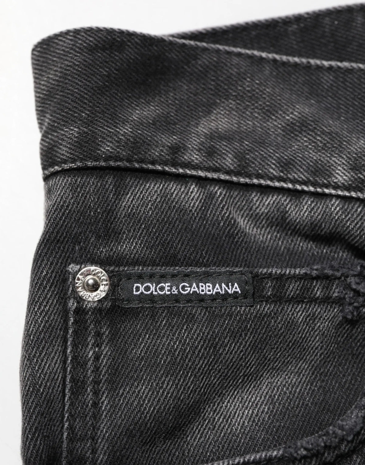 Jean noir en denim droit pour homme dolce gabbana avec effet marbré subtil et étiquette de marque cousue à la taille