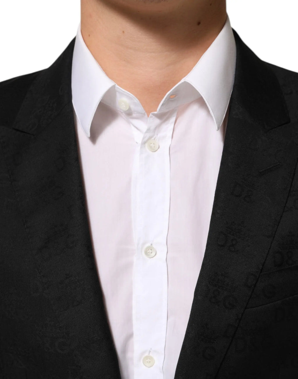 Dolce & gabbana blazer martini noir texturé avec motif logo subtil porté sur chemise blanche classique