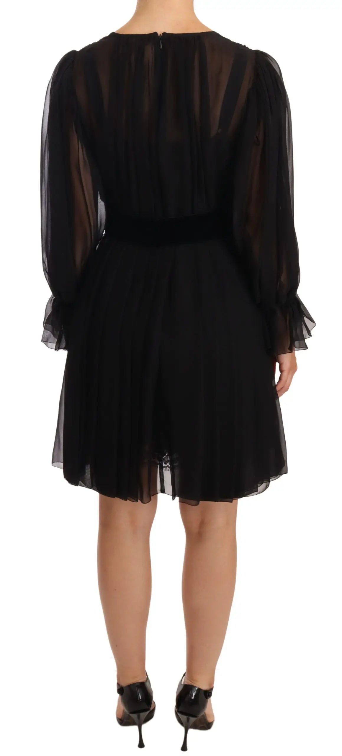 Robe noire en soie stretch dolce gabbana en mousseline transparente avec manches longues bouffantes et jupe plissée