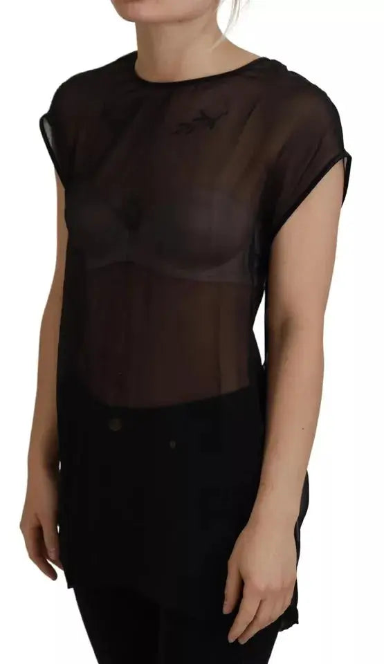 Dolce & gabbana blouse noire en mesh transparent à manches courtes avec détail brodé subtil sur la poitrine